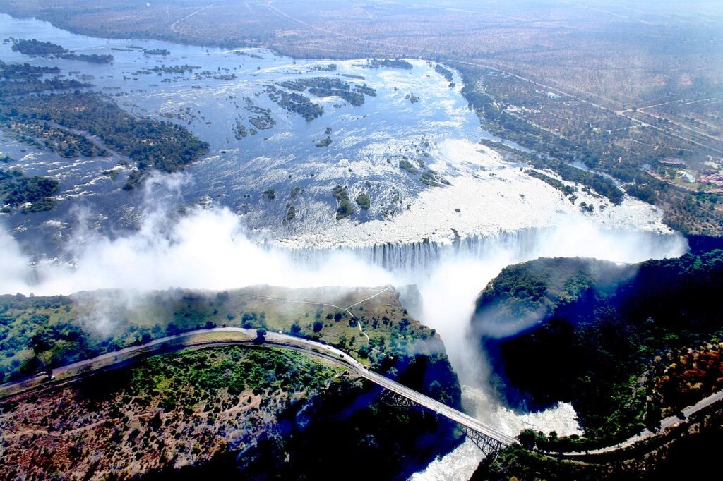 Photo showing the Zambezi River flowing over the Victoria Falls for trilling rafting adventures