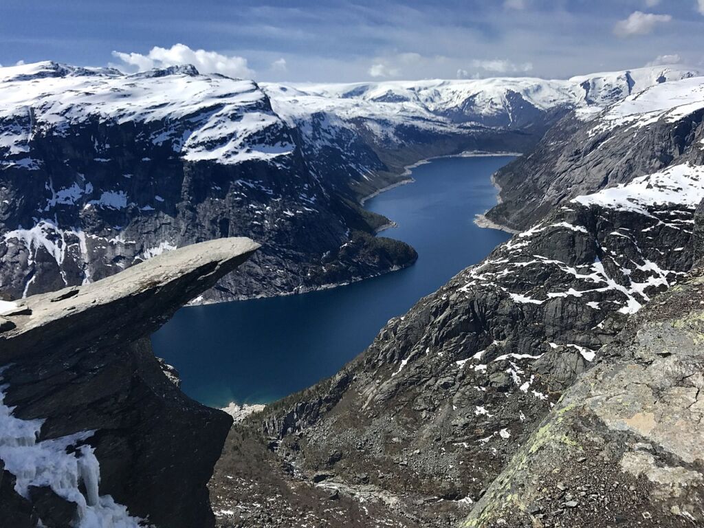 Photo showing Trolltunga on the left taken from above,  another one of the scenic mountain hike destinations