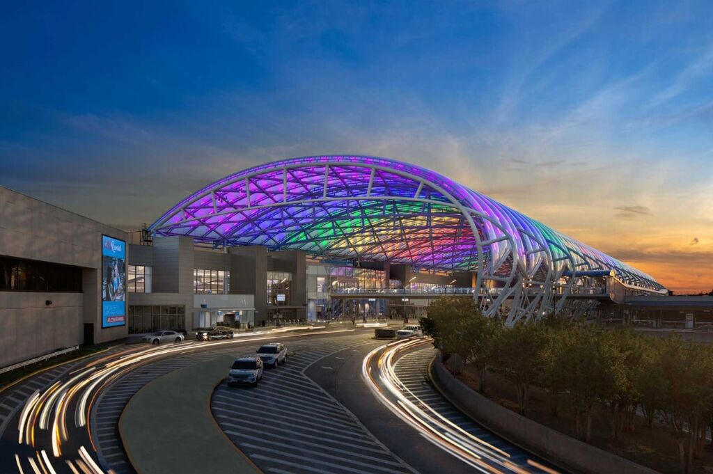 Terminal at Hartsfield Jackson Atlanta International Airport lit up in Rainbow colors