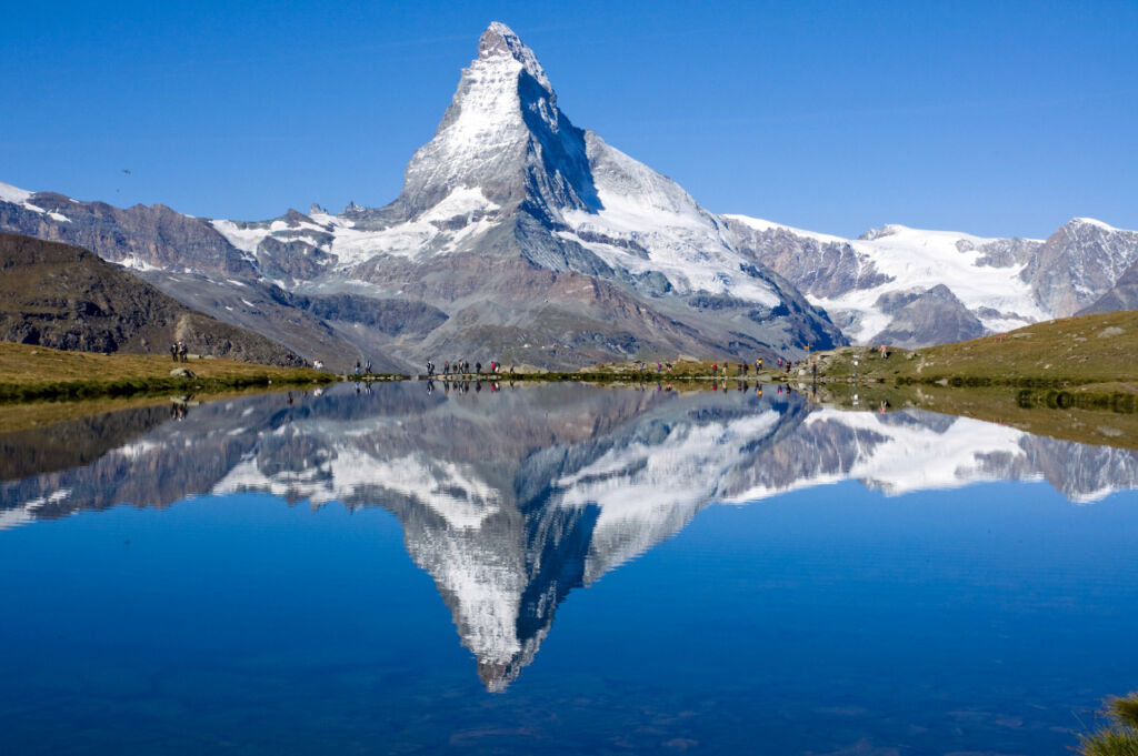 The iconic Matterhorn reflected in a mountain lake