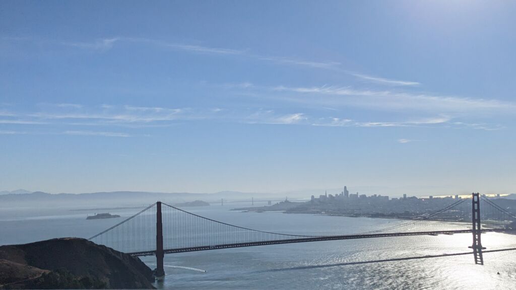 Sunny day photo of San Francisco and the Golden Gate Bridge from Hawk Hill in Marin County.