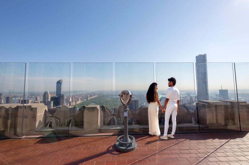 Couple in Love Taking in the Skyline from the Rockefeller Center Observation Deck - New York City