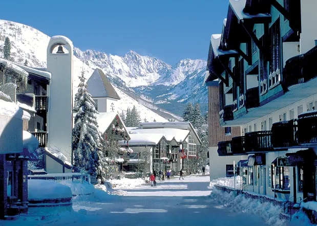 Vail Village with Mountains in the background and fresh snow